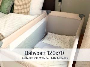 an open bed with a mattress and pillow on it at StayWest52 - Balkon, WLAN, Parkplatz in Ulm