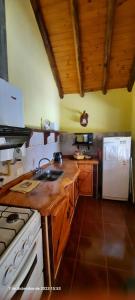 Kuchyň nebo kuchyňský kout v ubytování Cabañas Alünmew