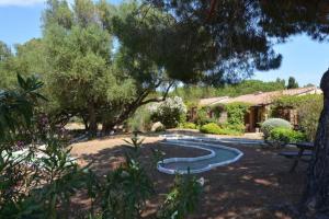 Zahrada ubytování Mini villa vue jardin dans résidence calme wifi piscine mer à pied