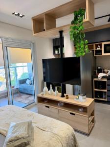 Η κουζίνα ή μικρή κουζίνα στο Studio Home Com Varanda, Ar-condicionado e Netflix +80 φωτογραφίες