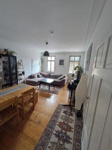 Posezení v ubytování Einzelzimmer mit Altbau Charme