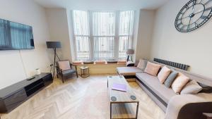 Et tv og/eller underholdning på Stunning Apartment By The Sea