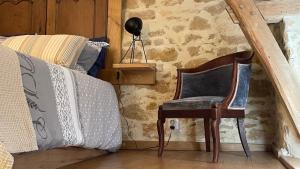 Posezení v ubytování Gîte la Tanière classé 3 étoiles avec terrasse et piscine + 45 fotografií