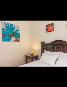 Ένα ή περισσότερα κρεβάτια σε δωμάτιο στο Casa Santiago