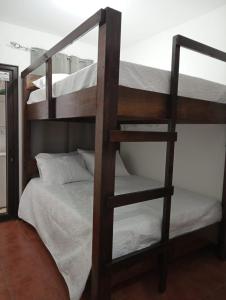 Ένα ή περισσότερα κρεβάτια σε δωμάτιο στο Casa Santiago