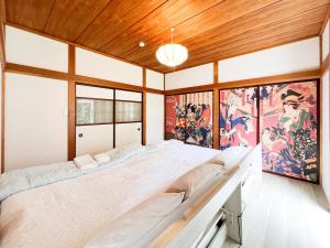 Voodi või voodid majutusasutuse FoSHI JR NIKKO 11min 7-11 7min toas