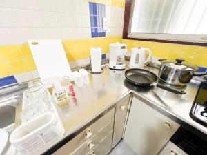 Köök või kööginurk majutusasutuses FoSHI JR NIKKO 11min 7-11 7min