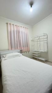 Postel nebo postele na pokoji v ubytování Casa em Santo André -SP