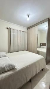 Postel nebo postele na pokoji v ubytování Casa em Santo André -SP + 11 fotografií