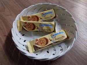 a white basket with several packets of berkowitzreck at Borgo delle Colonne 22 in Parma +25 photos