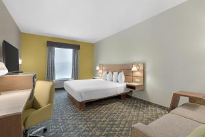 Ένα ή περισσότερα κρεβάτια σε δωμάτιο στο Best Western Wesley Chapel +42 φωτογραφίες