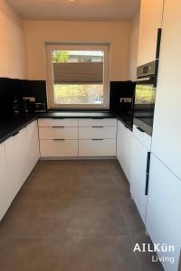 Kuchyň nebo kuchyňský kout v ubytování AIL Kün Living