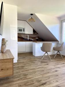 Kuchyň nebo kuchyňský kout v ubytování Przytulna Przystań