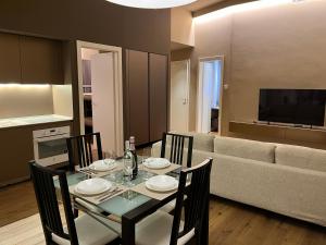 Et tv og/eller underholdning på Domus Carignano Luxury Apartment