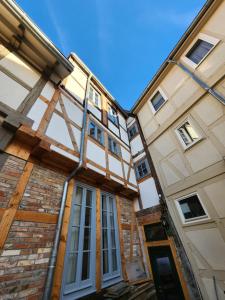 an exterior view of a building under construction at Fachwerkzeit Haus mit zwei Apartments in Quedlinburg