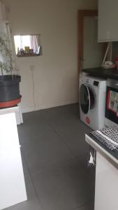 Η κουζίνα ή μικρή κουζίνα στο Mr Vinay`s Residence