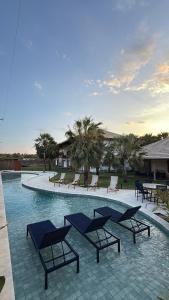 Πισίνα στο ή κοντά στο Casa a 2 minutos a pé da praia