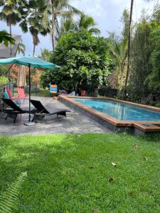 Φωτογραφία από το άλμπουμ του Balinese Beach House With Pool σε Pahoa