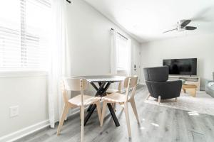 a dining room with a table and two chairs at The Vibe on Durham V 8782 in Durham