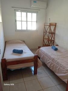 Giường trong phòng chung tại Nde roga