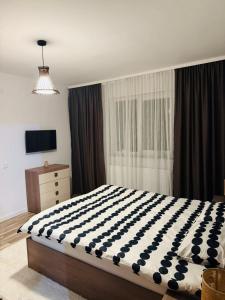 TV a/nebo společenská místnost v ubytování Gabone residence