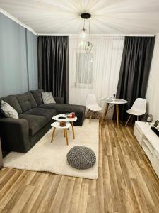 Posezení v ubytování Gabone residence + 1 fotografie