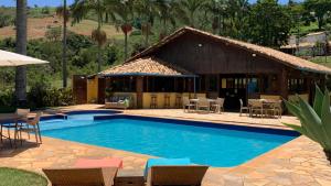 Bazén v ubytování Recanto do Rio em Jacutinga MG nebo v jeho okolí