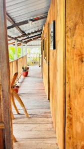 a hallway of a building with a wooden floor at Asoagropa in Buenaventura