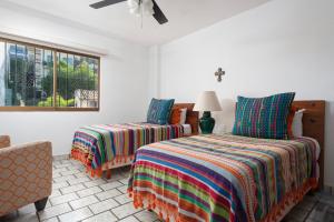 Ένα ή περισσότερα κρεβάτια σε δωμάτιο στο 2BR Oceanside Resort Condo Pool & Private Beach +18 φωτογραφίες