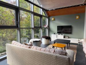 TV a/nebo společenská místnost v ubytování Belle Vue