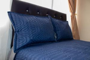 Ένα ή περισσότερα κρεβάτια σε δωμάτιο στο Hotel Inti Raymi