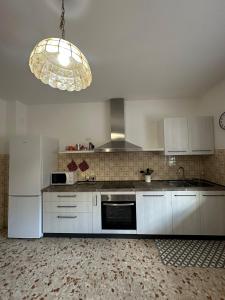 Nhà bếp/bếp nhỏ tại Appartamento San Lucano +5 ảnh