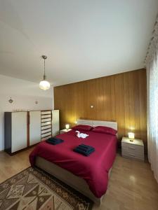 Ένα ή περισσότερα κρεβάτια σε δωμάτιο στο Appartamento San Lucano