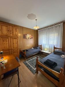 Giường trong phòng chung tại Appartamento San Lucano