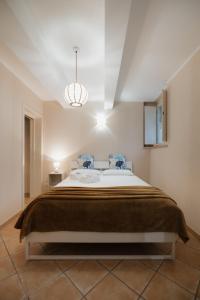 Ένα ή περισσότερα κρεβάτια σε δωμάτιο στο Serena's turistic apartament