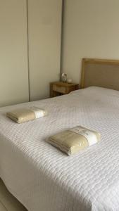 Ένα ή περισσότερα κρεβάτια σε δωμάτιο στο Caetano