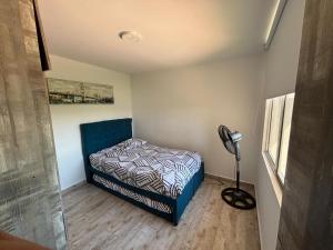 Ένα ή περισσότερα κρεβάτια σε δωμάτιο στο Apartamento en hacienda peñalisa mango, Ricaurte +10 φωτογραφίες