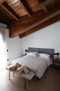 En eller flere senge i et værelse på Villa Rural Puerta del Gallo