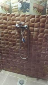 Ένα μπάνιο στο Guest house familly