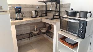 Η κουζίνα ή μικρή κουζίνα στο Suinda casa de campo +3 φωτογραφίες