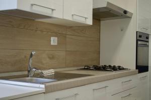 Nhà bếp/bếp nhỏ tại Montagne & Laghi Escape - Appartamento rinnovato +32 ảnh