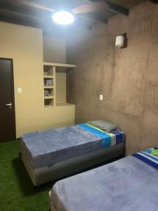 En eller flere senge i et værelse på Casa de campo