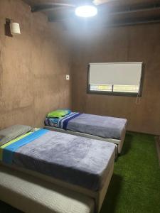 En eller flere senge i et værelse på Casa de campo + 14 billeder