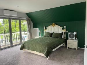 Postel nebo postele na pokoji v ubytování Hamilton Greenhill Lodge - Near Highway Quiet Country Stay + 18 fotografií