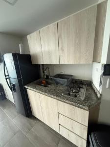 Kuchyň nebo kuchyňský kout v ubytování Apartamento Piso Alto Vista a la Universidad