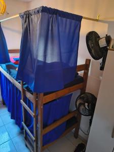 En eller flere senge i et værelse på Hostel casa da ana + 88 billeder