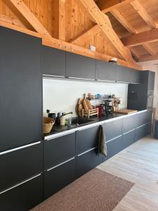 Kuchyň nebo kuchyňský kout v ubytování Chalet Villarenger