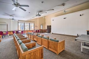 a classroom with chairs and a whiteboard in a room at 8 Mi to Mt Snow Cozy Bear Cabin with Hot Tub! in Wilmington +32 photos