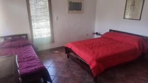 En eller flere senge i et værelse på El descanso tiene nombre: Sonko + 81 billeder