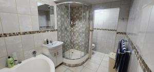 Koupelna v ubytování 567 on Strelitzia - Shelly Beach + 11 fotografií